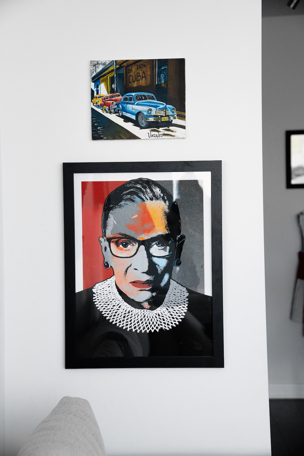 Colourful portrait of the late Justice Ruth Bader Ginsburg hanging on the condo wall