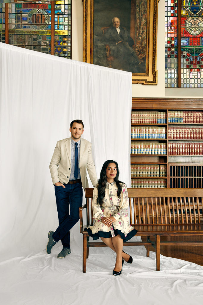 Nicholas Hill and Aliya Ramji photographed in Convocation Hall at Osgoode Hall