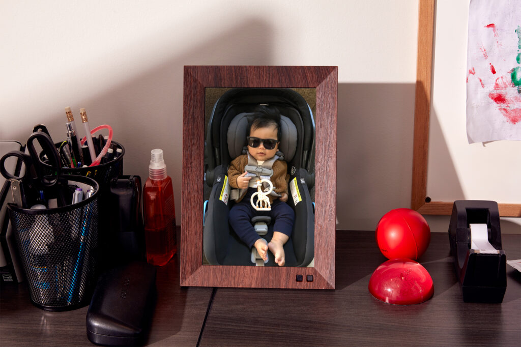 Picture frame featuring a photos of Jennifer's son