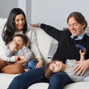Stefanie Holland and family relaxing on the couch